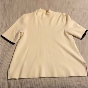 Anthropologie off white w/ black swing sweater top